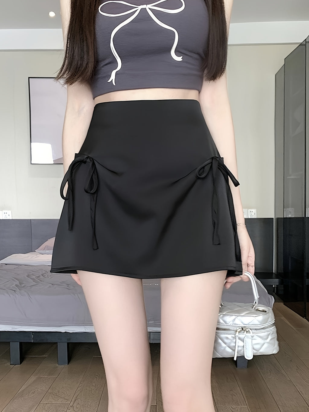 Pink Satin Half-Length Skirt for Women, Designed to Hide Imperfections, Featuring a Bow, High Waist, Slimming A-Line Shape, And Body-Hugging Fit.