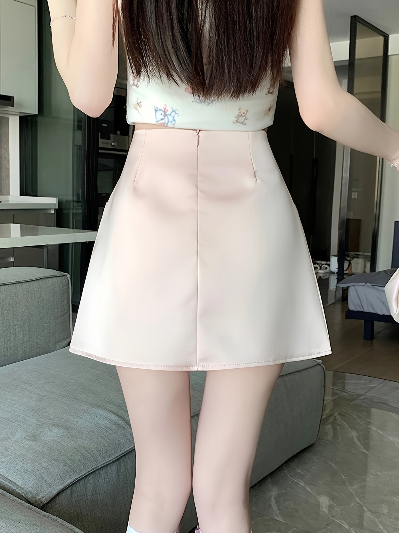 Pink Satin Half-Length Skirt for Women, Designed to Hide Imperfections, Featuring a Bow, High Waist, Slimming A-Line Shape, And Body-Hugging Fit.